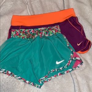 2 pairs of girls Nike shorts